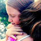 Girl giving a hug